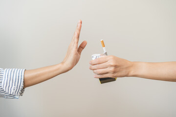 Quit smoking, stop smoke, addiction asian young woman, girl refusing cigarette, smoker quitting smoke, hand in refuse, deny tobacco. Quit bad habit, health care concept. Willpower lifestyle of people. - obrazy, fototapety, plakaty