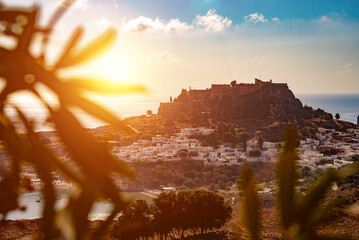 Acropolis of Lindos and city on the island of Rhodes in Greece. - obrazy, fototapety, plakaty