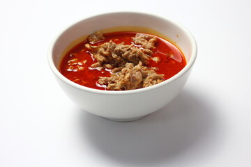 Thai food, Spicy red curry with pork on white background