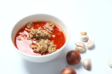 Thai food, Spicy red curry with pork on white background
