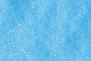 Texture of the white fluffy snow for background