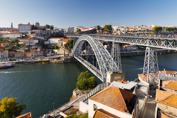 View of Don Luis I bridge, which connect Porto and Vilanova de Gaia in Portugal.  - obrazy, fototapety, plakaty