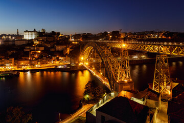 View at night of Don Luis I bridge, which connect Porto and Vilanova de Gaia in Portugal. 