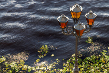 Street lights in classic style at the embankment of Kaliningrad, Russia