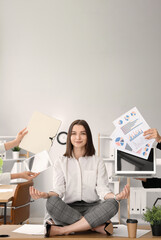 Young businesswoman with a lot of work meditating in office