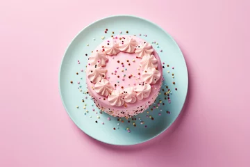 Fotobehang Cake with pink whipped cream, colorful confectionery sprinkles. Top view. © Alexandr_DG