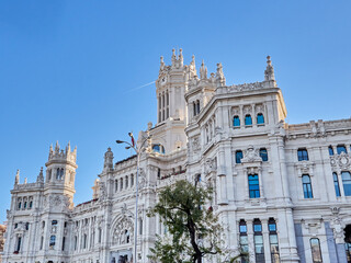 Fototapeta na wymiar Cibeles Palace, former Communications Palace, is the seat of Madrid City Council. Town Hall building in Cibeles square. Madrid, Spain, Europe. December 2023