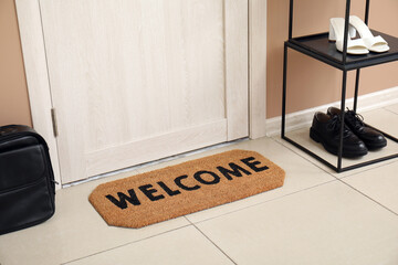 Doormat with word WELCOME in hall