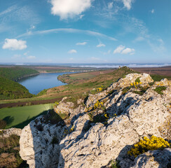 Ukraine without russian aggression. Amazing spring view on the Dnister River Canyon with picturesque rocks, fields, flowers. This place named Shyshkovi Gorby,  Nahoriany, Chernivtsi region, Ukraine.