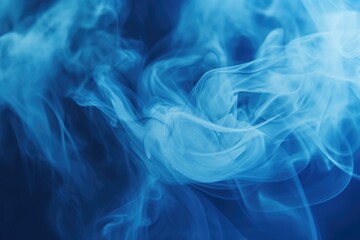 Obraz premium Close up of blue smoke on a black background. Versatile image for various design projects