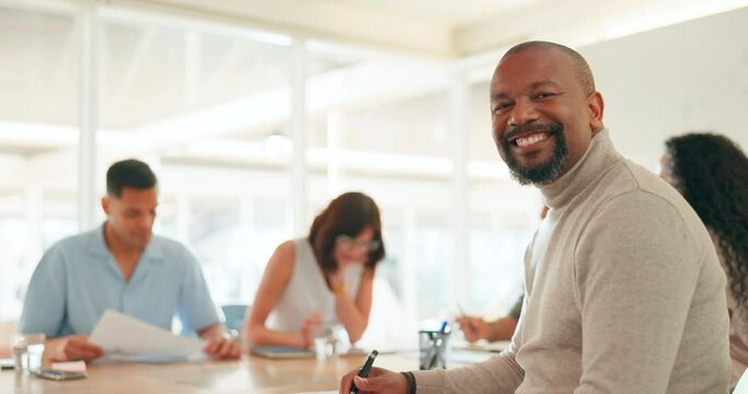Business, leadership and black man with smile at meeting or workshop for strategy, planning and performance report. Teamwork, collaboration and happy businessman ceo at table at advertising agency.