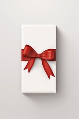 A white gift box with a red bow. Perfect for any occasion