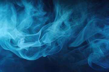 Blue smoke captured in a close-up shot against a black background. Perfect for adding a touch of mystery and intrigue to your designs