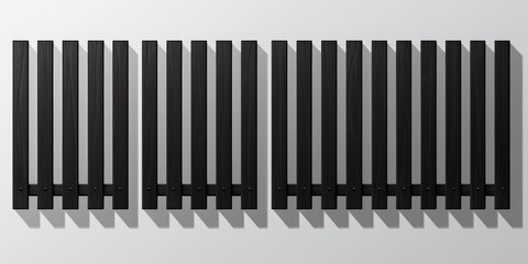 Four black and white radiators, suitable for modern interior design. Perfect for heating up any room.