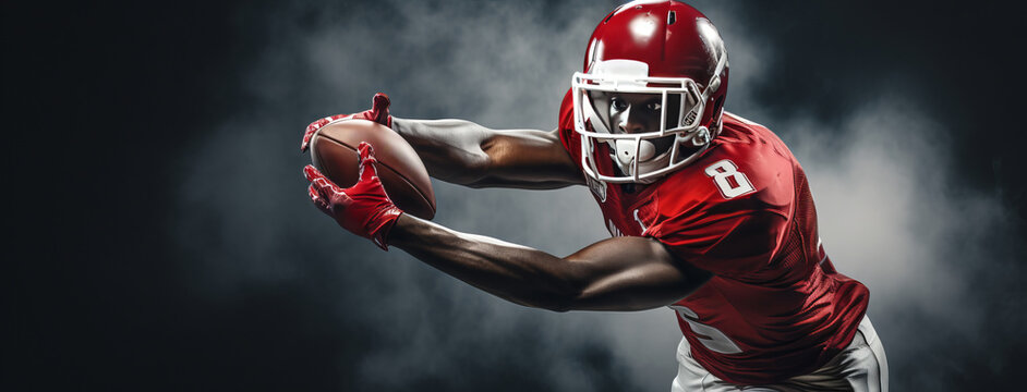 a football player catching a ball