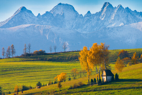 A chapel in autumn in Kacwin, Poland, overlooking the Tatra Mountains