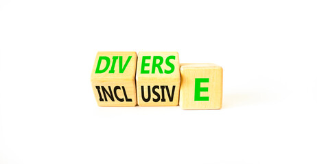 Diverse and inclusive symbol. Concept word Diverse and Inclusive on wooden cubes. Beautiful white table white background. Business diverse and inclusive concept. Copy space.