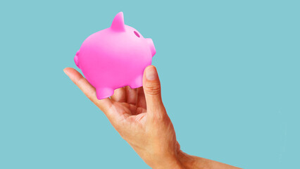 Flexible spending account FSA. Piggy bank in the hand. Funds Management