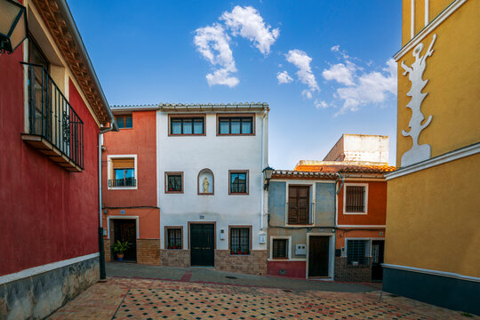 Bullas Clock Tower Square, Region of Murcia, with typical colorful houses