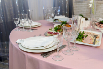 Cutlery for eating in a restaurant. Food on the festive table.