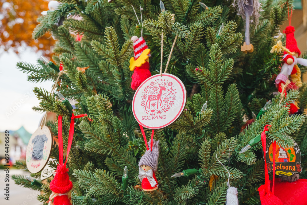 Wall mural Christmas in Solvang. Close-up of ornaments on a Christmas tree. Solvang is a California popular small town with traditional Danish-style architecture