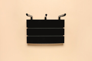 Modern wi-fi router on beige background