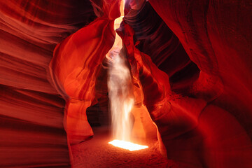 Sunlight penetrates the cave in Antelope Canyon in Arizona at midday
