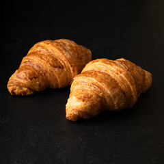 croissant on wooden table
