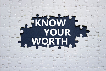Know your worth symbol. Concept words Know your worth on white puzzle. Beautiful deep blue...
