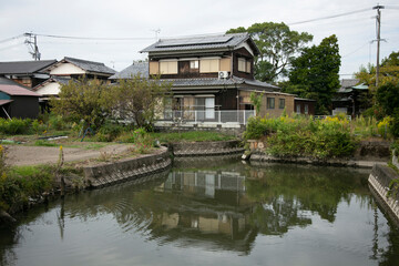 Obraz premium The city of Yanagawa in Fukuoka has beautiful canals to stroll along with its boats run by skilled boatmen.