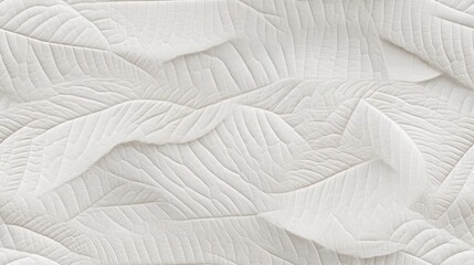  a close up of a white textured wallpaper with a pattern of leaves on the outside of the wall.