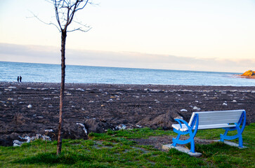 Park and bench. Sea beach and seating areas.