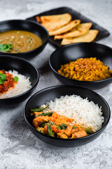 Set of Asian food: rice with stew and vegetables, lentil soup puree and Naan flatbread, fresh menu. - 694534575