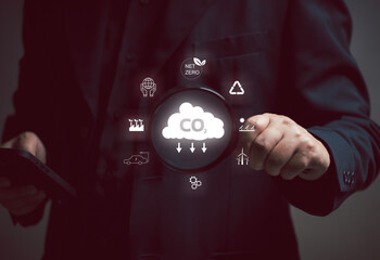 Concepts about reducing greenhouse gases Reducing air pollution Strategic Promotion of Recovery and Destruction of Fluorocarbons. man uses a magnifying glass to look at air pollution.