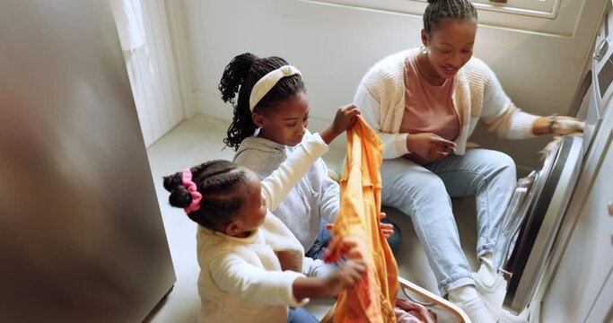 Laundry, children helping mother in home and family cleaning together, learning and support from mom. Clothes, basket and washing machine, black woman and kids with chores, smile and clean clothing.