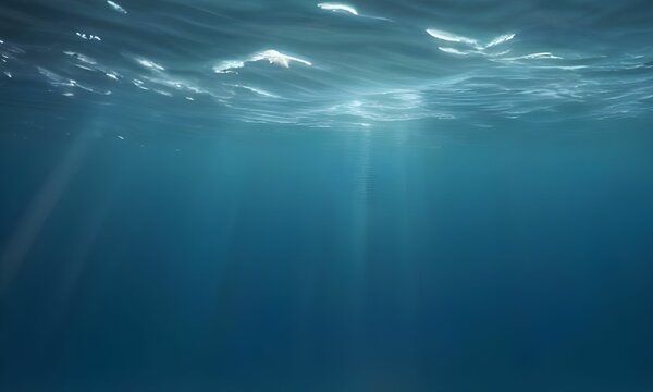 Deep blue sea background with sunlight shining. sea under water level, ocean or sea