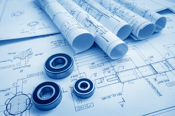 Architect workplace. Architectural project, blueprints, blueprint rolls on wooden desk table. Construction background. Engineering tools. Copy space