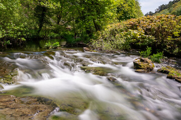 Long exposure of a waterfall on the East Lyn River in The Doone Valley in Exmoor National Park