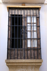Window of typical whitewashed house in Ronda, Malaga