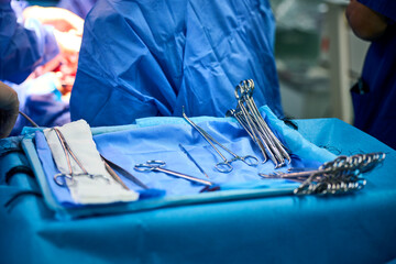 Surgical instruments are on the table in the operating room