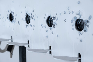 Close up of open biathlon targets. Traces of missed bullets around the target holes