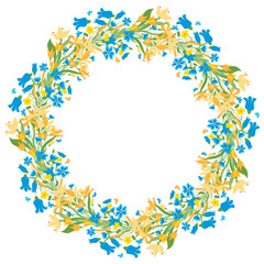 Decorative floral wreath from blossoming blue bells,cornflowers,yellow daffodils