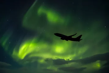  Plane with Northern lights (Aurora Borealis)  © Christopherab
