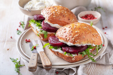 Delicious and fresh sandwich with creamy cheese and beetroot.