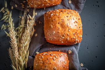 Wholegrains and healthy oat buns baked in bakery.