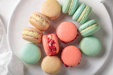 Sweet and delicious macaroons made of creams and meringues.