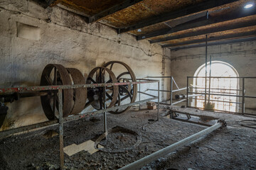Obraz premium The Enchanting Old Brick Distillery Adjacent to an Abandoned Manor – For Sale