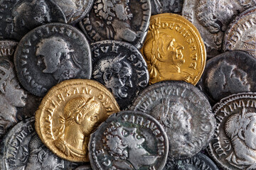A treasure of Roman gold and silver coins.Trajan Decius. AD 249-251. AV Aureus.Ancient coin of the Roman Empire.Authentic silver denarius, antoninianus,aureus of ancient Rome.Antikvariat.