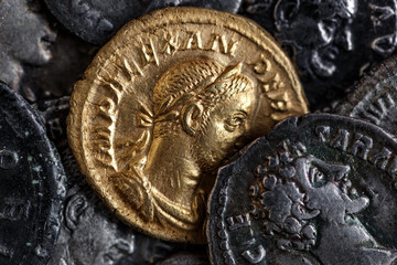 A treasure of Roman gold and silver coins.Trajan Decius. AD 249-251. AV Aureus.Ancient coin of the...