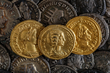 A treasure of Roman gold and silver coins.Trajan Decius. AD 249-251. AV Aureus.Ancient coin of the...
